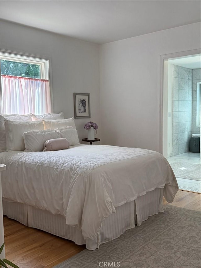 315 W 6th Ave, Chico, CA 95926 - bedroom featuring wood finished floors and ensuite bathroom