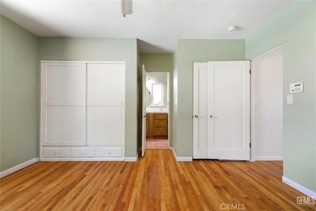 700 Hillcrest Dr, Bakersfield, CA 93305 - unfurnished bedroom with light wood-style flooring and ceiling fan