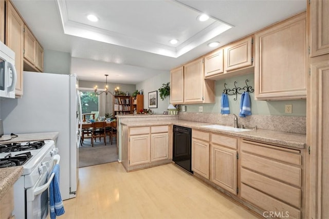 13562 Mahogany Pl, Tustin, CA 92782 - kitchen with light brown cabinets, dishwasher, light wood-style flooring, white gas range oven, and a tray ceiling