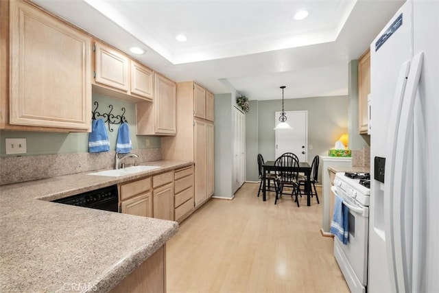 13562 Mahogany Pl, Tustin, CA 92782 - kitchen with white appliances, light brown cabinetry, light wood-style floors, and recessed lighting