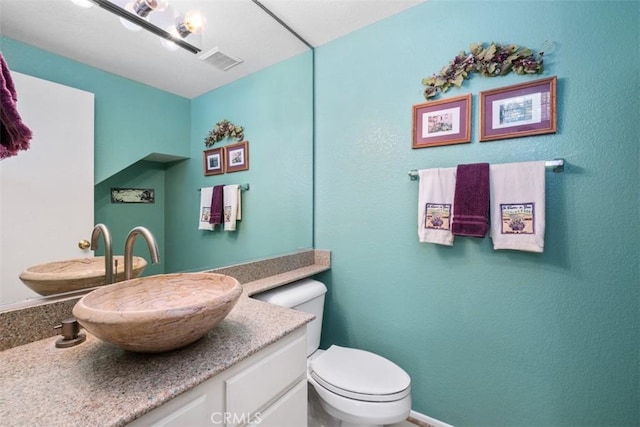 13562 Mahogany Pl, Tustin, CA 92782 - bathroom featuring toilet and vanity