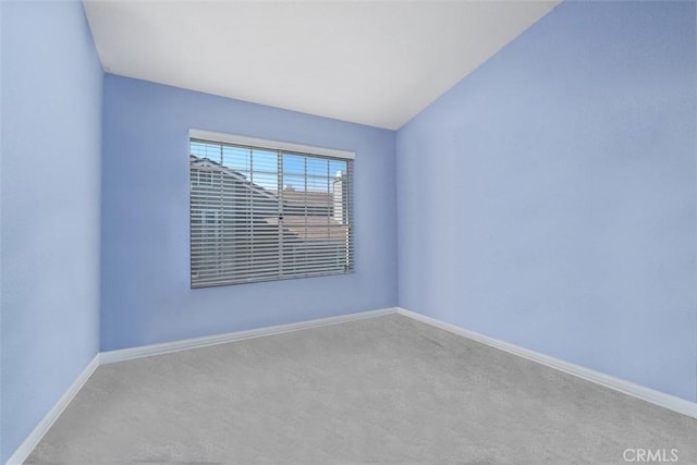 13562 Mahogany Pl, Tustin, CA 92782 - carpeted empty room with baseboards