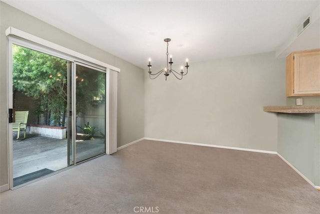 13562 Mahogany Pl, Tustin, CA 92782 - unfurnished dining area featuring a chandelier and carpet flooring