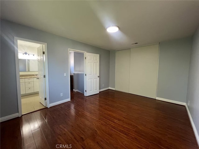 4539 Brookview Ct, Chino Hills, CA 91709 - unfurnished bedroom with wood finished floors, a closet, and connected bathroom