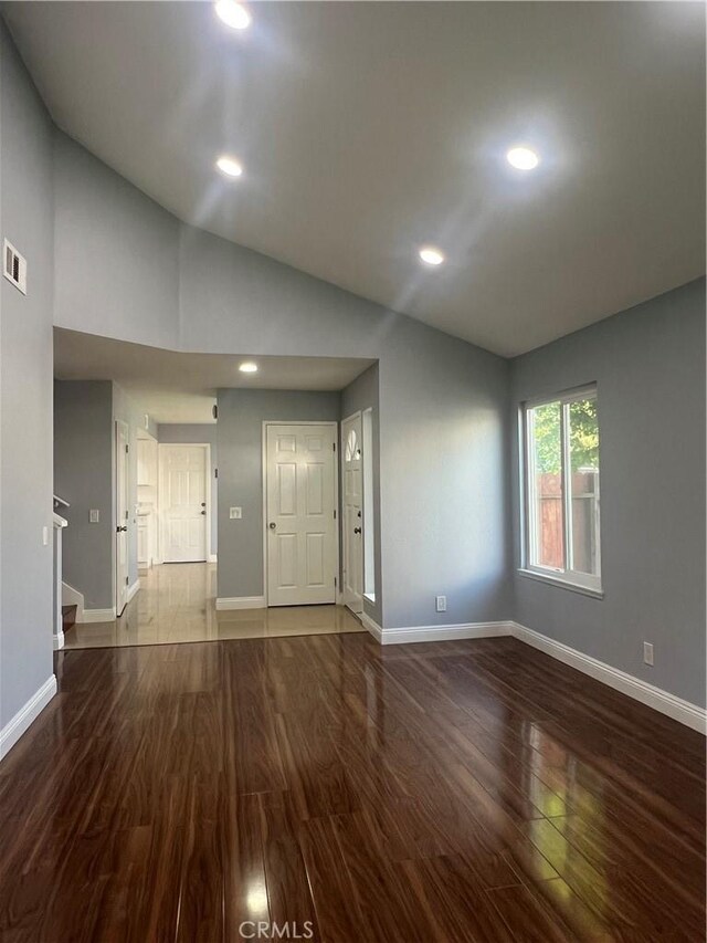 4539 Brookview Ct, Chino Hills, CA 91709 - unfurnished living room with wood finished floors, lofted ceiling, and recessed lighting
