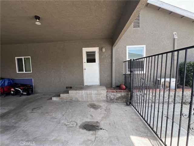 246 E 27th St, San Bernardino, CA 92404 - property entrance with stucco siding