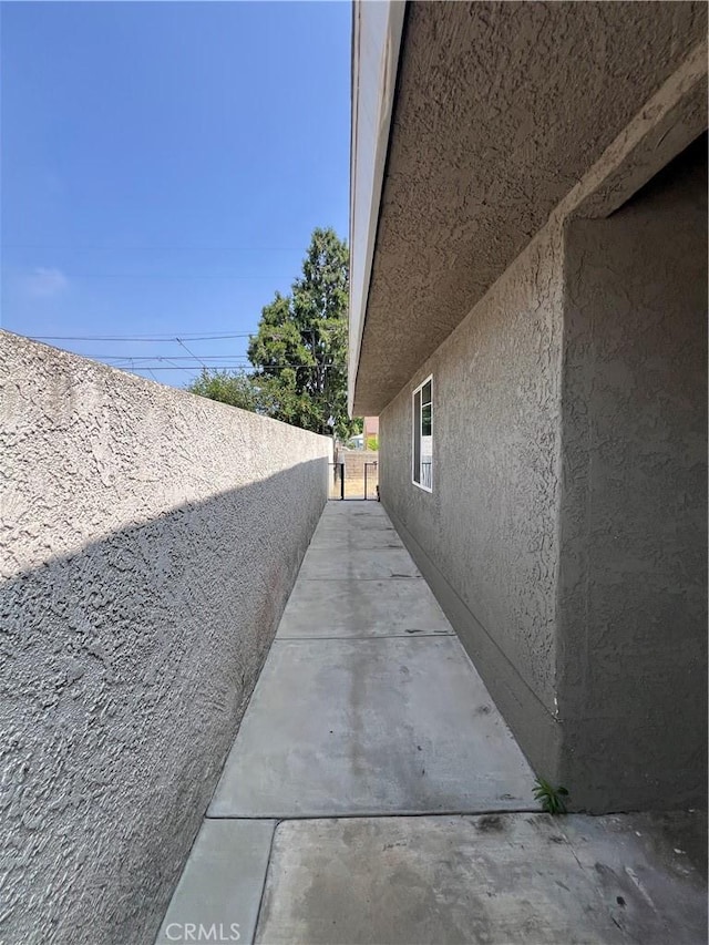 246 E 27th St, San Bernardino, CA 92404 - view of home's exterior with stucco siding