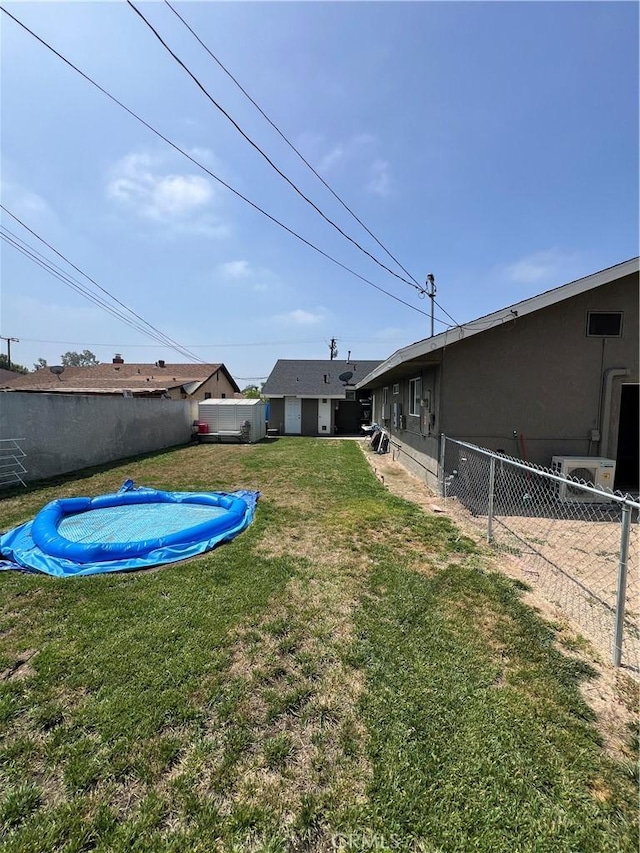 246 E 27th St, San Bernardino, CA 92404 - fenced backyard with a swimming pool