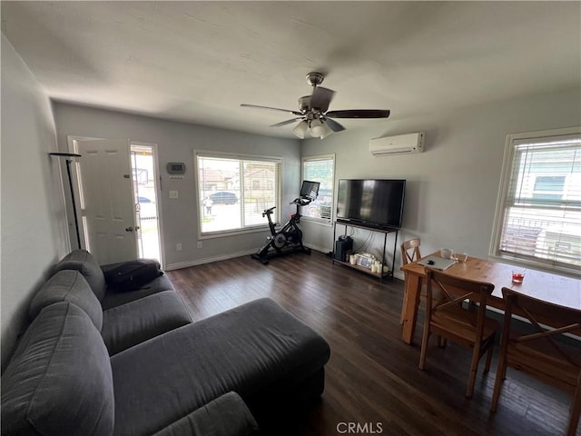 246 E 27th St, San Bernardino, CA 92404 - living area featuring dark wood-style flooring, an AC wall unit, and a ceiling fan
