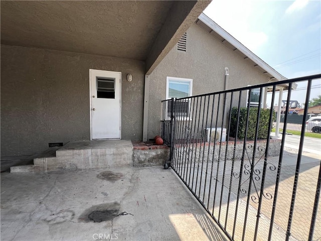 246 E 27th St, San Bernardino, CA 92404 - entrance to property with stucco siding