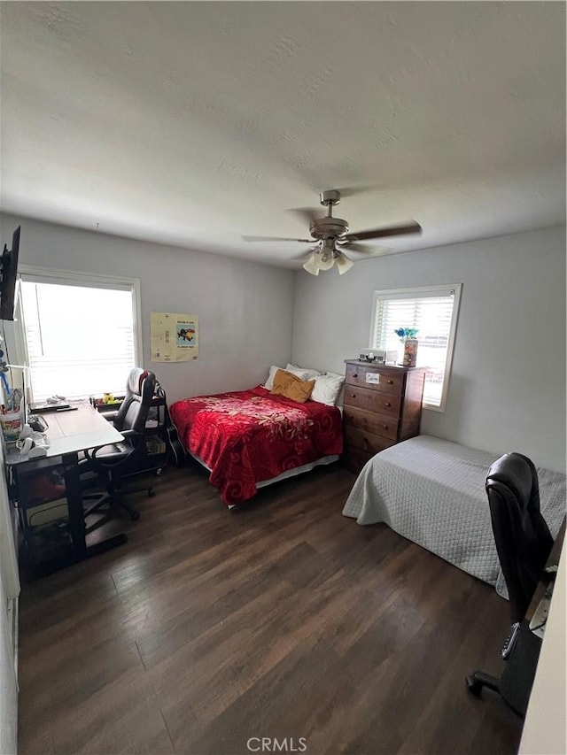 246 E 27th St, San Bernardino, CA 92404 - bedroom with a desk, wood finished floors, and a ceiling fan