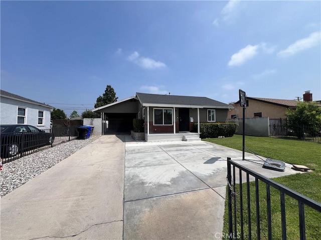 246 E 27th St, San Bernardino, CA 92404 - ranch-style home featuring concrete driveway, brick siding, and an attached carport