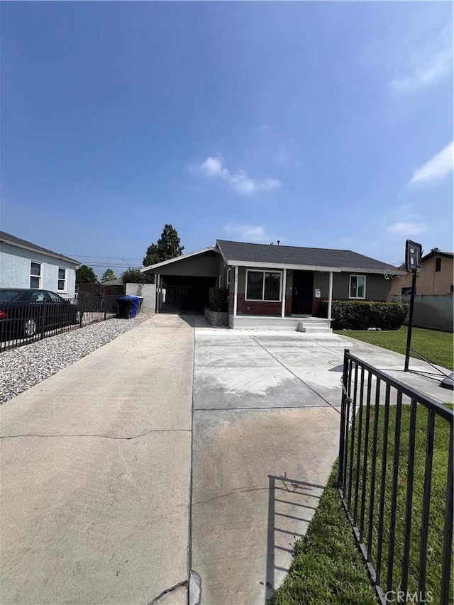246 E 27th St, San Bernardino, CA 92404 - single story home featuring concrete driveway and an attached carport
