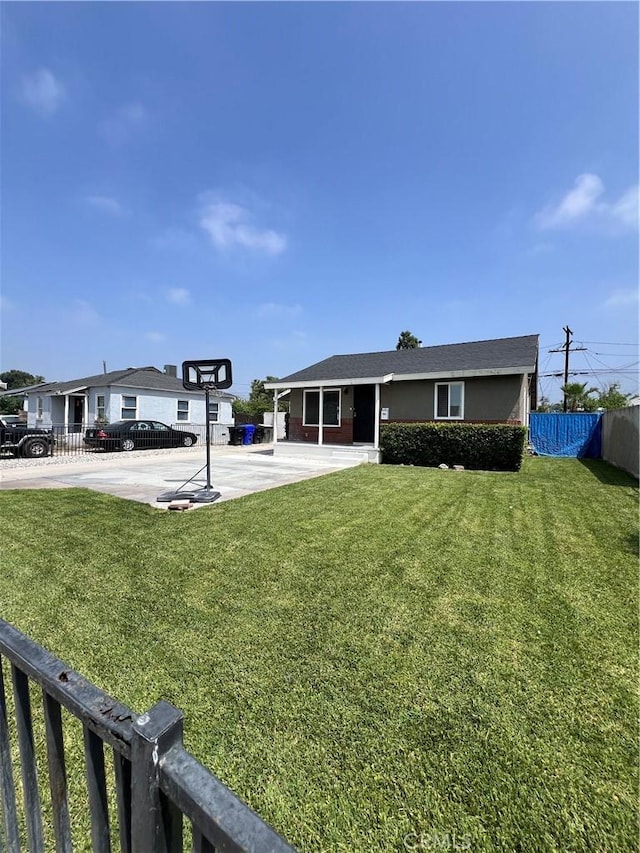 246 E 27th St, San Bernardino, CA 92404 - view of yard featuring a patio area