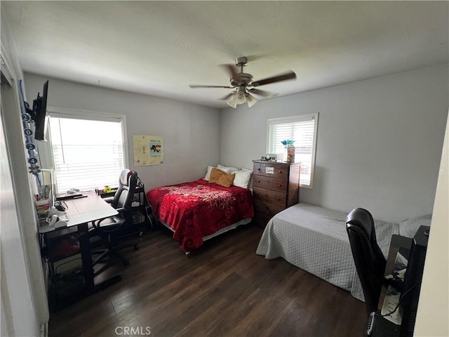 246 E 27th St, San Bernardino, CA 92404 - bedroom featuring dark wood finished floors, ceiling fan, and a desk