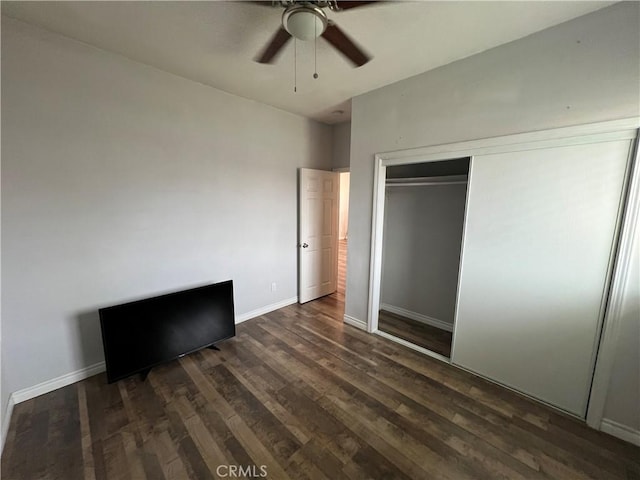 246 E 27th St, San Bernardino, CA 92404 - unfurnished bedroom featuring dark wood-type flooring, a closet, and ceiling fan