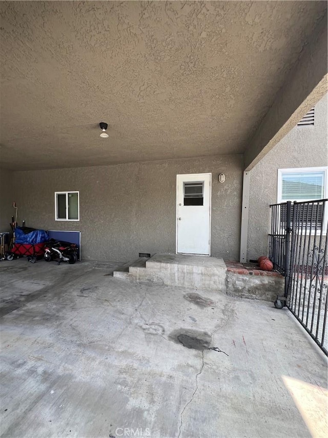 246 E 27th St, San Bernardino, CA 92404 - view of exterior entry featuring stucco siding