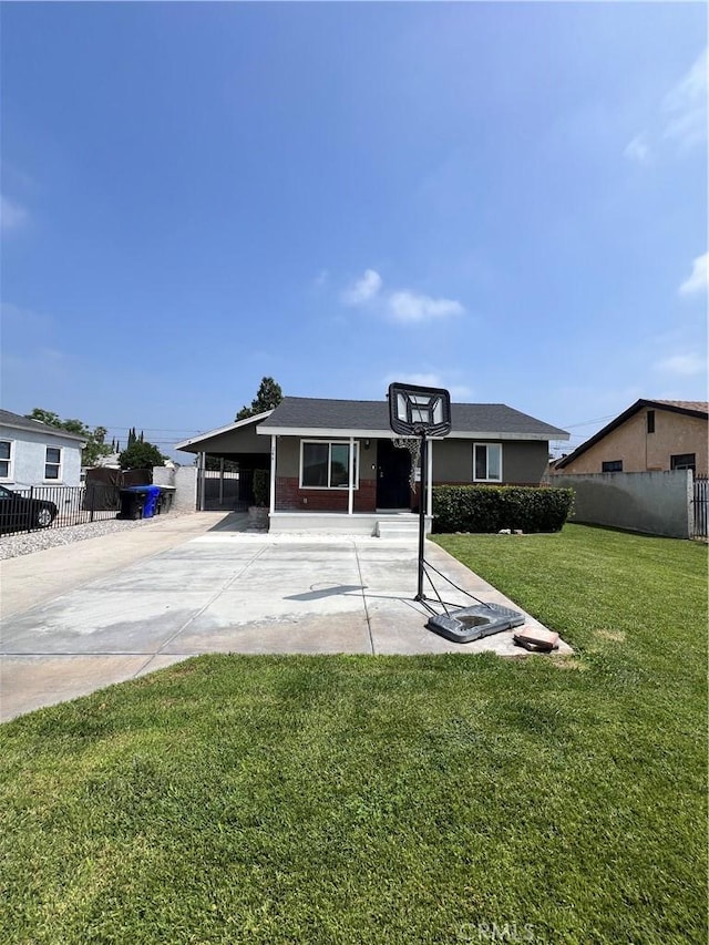 246 E 27th St, San Bernardino, CA 92404 - view of front of home featuring concrete driveway and an attached carport