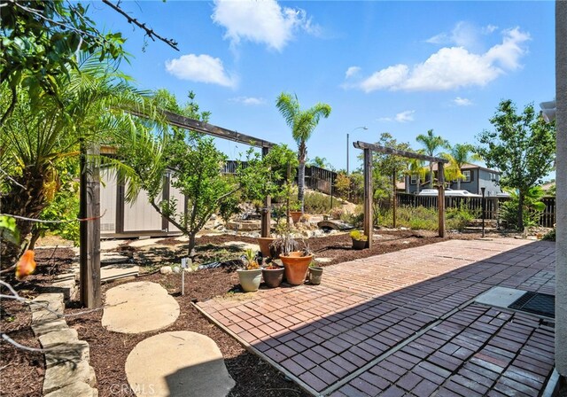 39312 Via Belleza, Murrieta, CA 92563 - fenced backyard with a patio