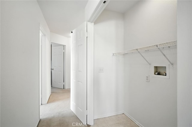 39312 Via Belleza, Murrieta, CA 92563 - washroom featuring washer hookup and baseboards