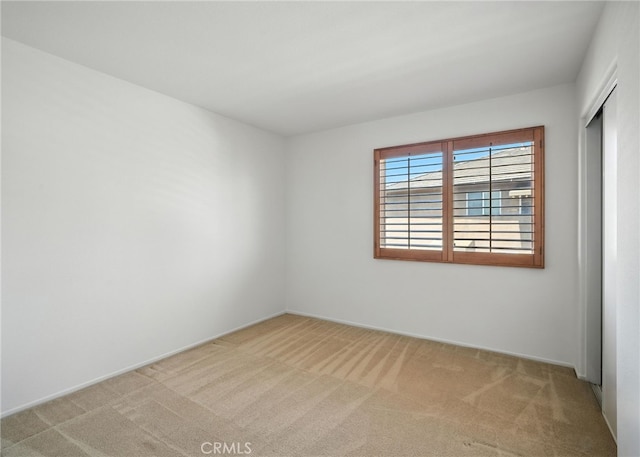 39312 Via Belleza, Murrieta, CA 92563 - empty room featuring light carpet and baseboards