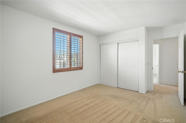 39312 Via Belleza, Murrieta, CA 92563 - unfurnished bedroom with light carpet and a closet