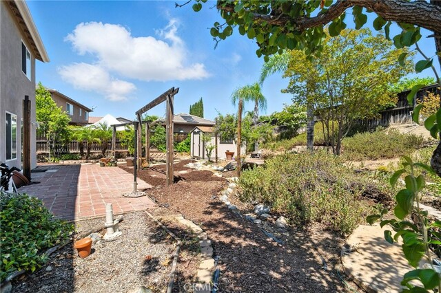 39312 Via Belleza, Murrieta, CA 92563 - view of yard featuring a patio area