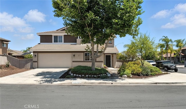 39312 Via Belleza, Murrieta, CA 92563 - view of front of property with concrete driveway, a garage, stucco siding, and a tile roof