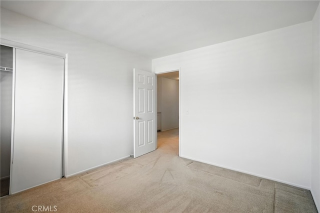 39312 Via Belleza, Murrieta, CA 92563 - unfurnished bedroom with light carpet and a closet