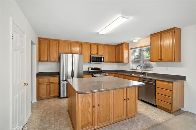 39312 Via Belleza, Murrieta, CA 92563 - kitchen featuring appliances with stainless steel finishes, dark countertops, light flooring, and brown cabinets