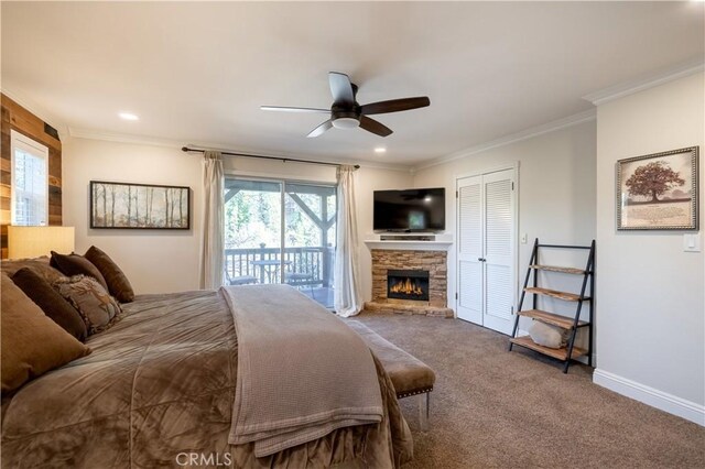 813 Brentwood Dr, Lake Arrowhead, CA 92352 - carpeted bedroom featuring access to outside, a stone fireplace, ornamental molding, recessed lighting, and ceiling fan