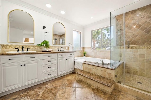 6407 Ruby, Carlsbad, CA 92011 - bathroom with double vanity, a shower stall, a bath, ornamental molding, and stone tile flooring
