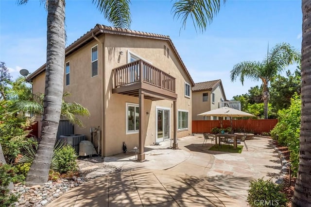 6407 Ruby, Carlsbad, CA 92011 - back of property with a balcony, stucco siding, and a patio area