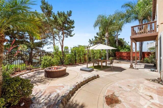 6407 Ruby, Carlsbad, CA 92011 - patio / terrace with a fire pit, a patio, and a fenced backyard