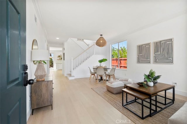6407 Ruby, Carlsbad, CA 92011 - living area with stairs, ornamental molding, light wood-style floors, and recessed lighting