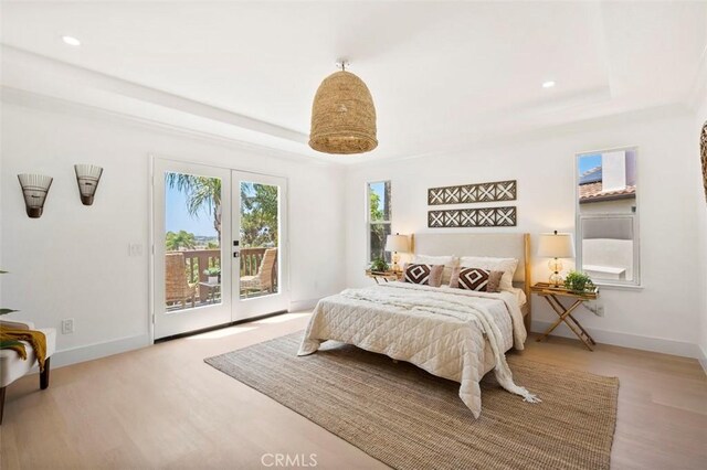6407 Ruby, Carlsbad, CA 92011 - bedroom featuring access to outside, wood finished floors, a raised ceiling, and recessed lighting