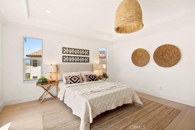 6407 Ruby, Carlsbad, CA 92011 - bedroom with a tray ceiling, multiple windows, wood finished floors, crown molding, and recessed lighting