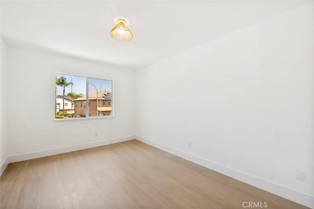 6407 Ruby, Carlsbad, CA 92011 - spare room featuring light wood-style flooring and baseboards