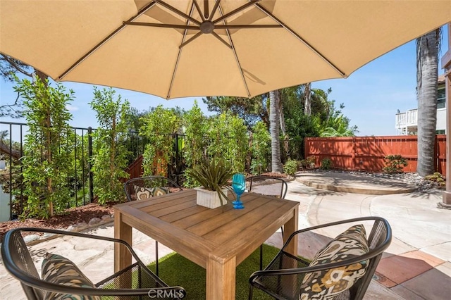 6407 Ruby, Carlsbad, CA 92011 - fenced backyard with a patio and outdoor dining space
