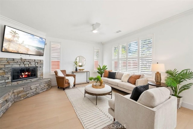 6407 Ruby, Carlsbad, CA 92011 - living area featuring a ceiling fan, ornamental molding, a fireplace, and wood finished floors