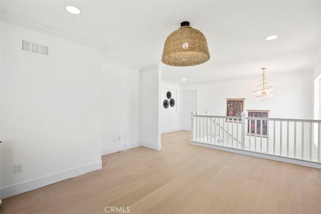 6407 Ruby, Carlsbad, CA 92011 - empty room with light wood-style flooring, ornamental molding, recessed lighting, and a chandelier