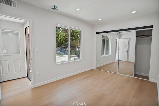 10324 Silverton Ave, Tujunga, CA 91042 - unfurnished bedroom featuring light wood-style floors, recessed lighting, and a closet