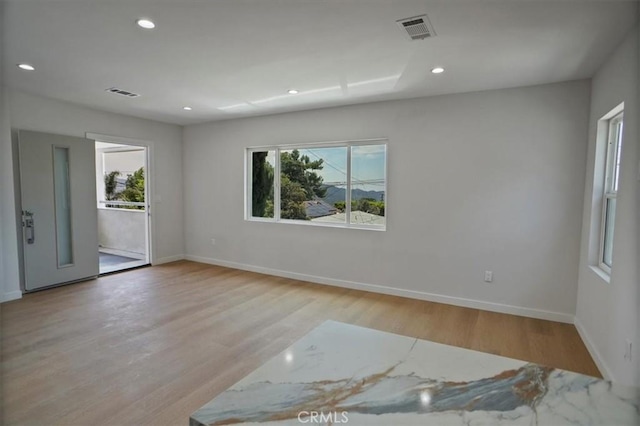 10324 Silverton Ave, Tujunga, CA 91042 - unfurnished room featuring wood finished floors and recessed lighting