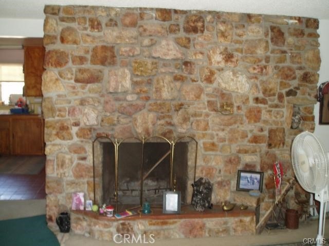 67190 Dillon Rd, Desert Hot Springs, CA 92240 - detailed view of a fireplace with raised hearth