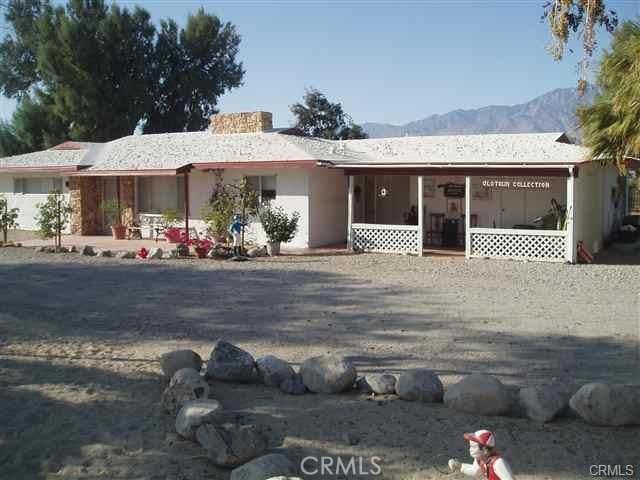 67190 Dillon Rd, Desert Hot Springs, CA 92240 - single story home with a mountain view and a porch