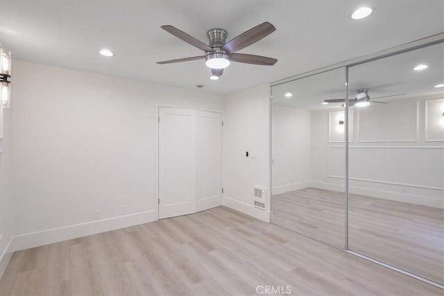 229 Springview, Irvine, CA 92620 - unfurnished bedroom with wood finished floors, recessed lighting, a closet, and ceiling fan