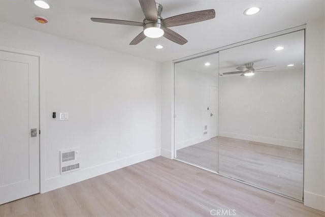 229 Springview, Irvine, CA 92620 - unfurnished bedroom featuring recessed lighting, wood finished floors, a closet, and ceiling fan