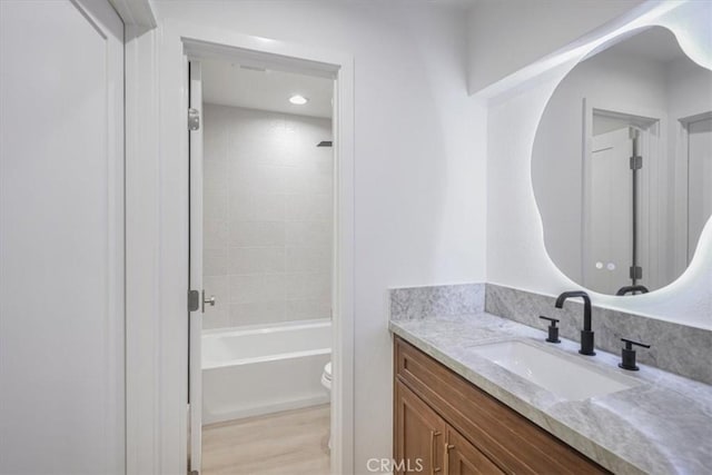 229 Springview, Irvine, CA 92620 - full bathroom featuring vanity, shower / bathtub combination, and wood finished floors