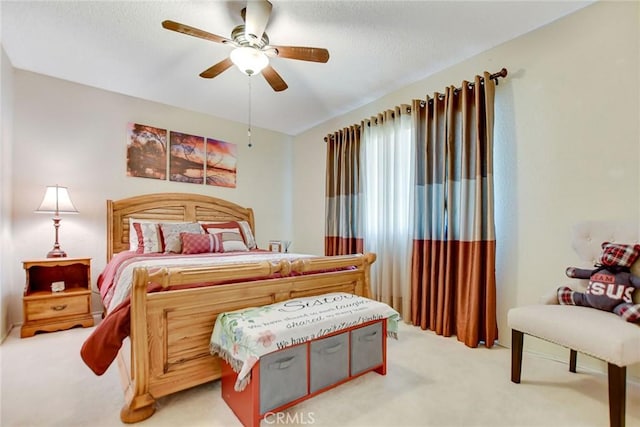 21821 Carlisle Rd, Apple Valley, CA 92307 - carpeted bedroom with ceiling fan