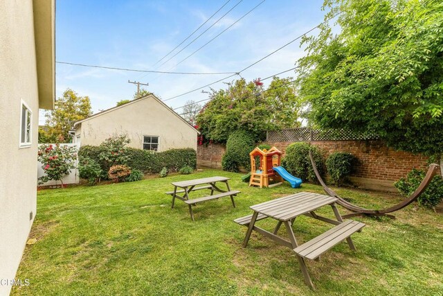 357 Northcliff Rd, Pasadena, CA 91107 - fenced backyard featuring a playground